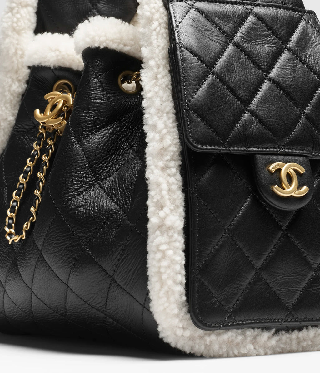 Chanel 25 Leather Handbag Small Black Shearling