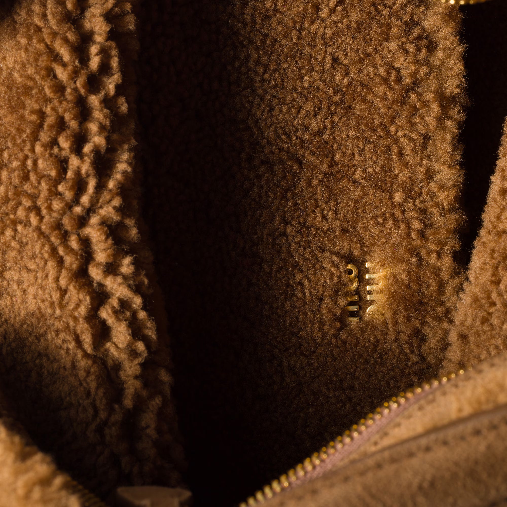 Miu Miu Aventure shearling bag
